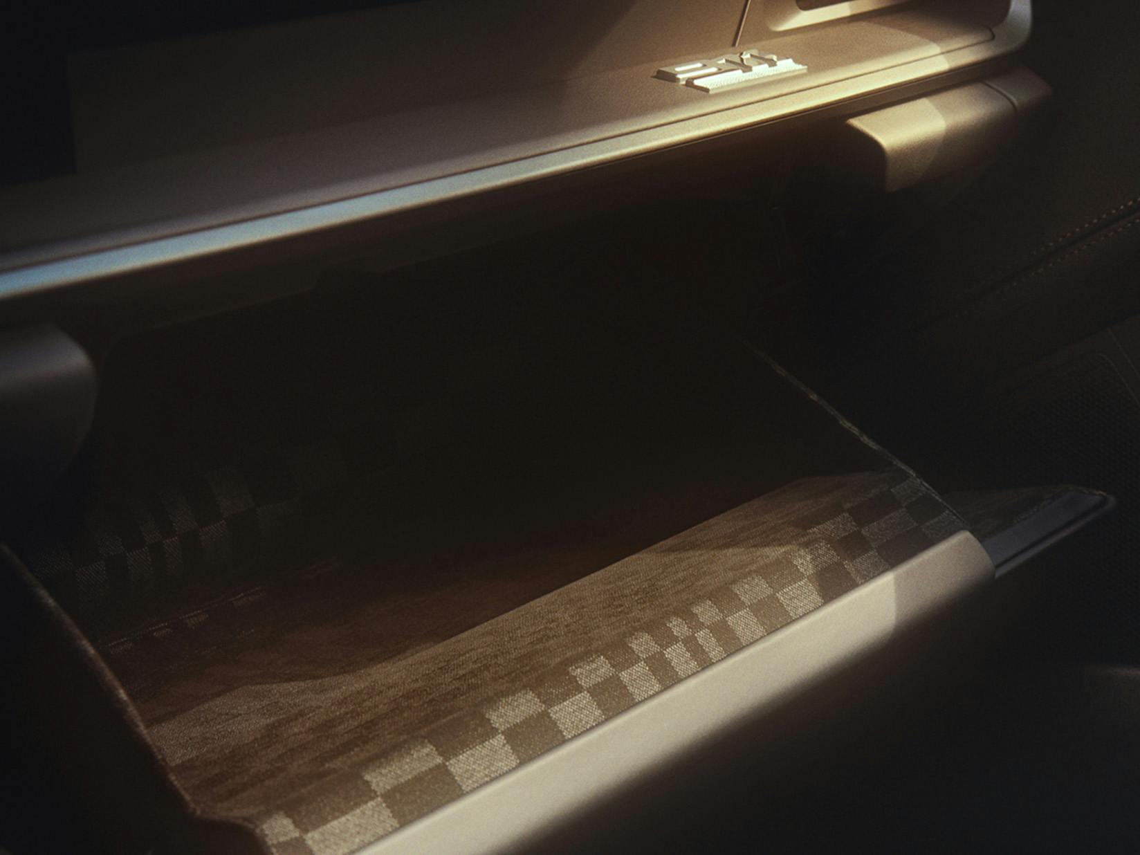 View into the open glove compartment in the Porsche 911 Targa with Heritage Design Package Pasha.