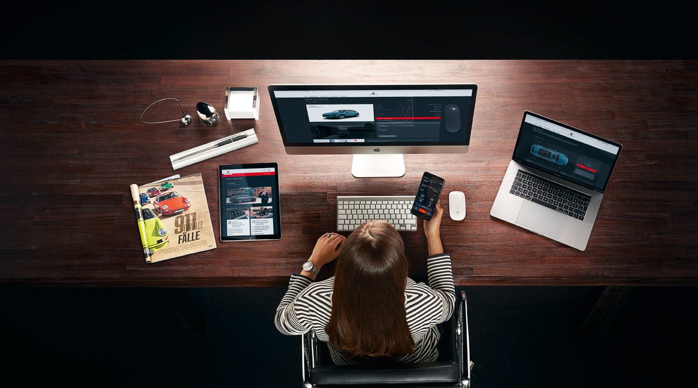 Woman logged on to Porsche website with different devices.