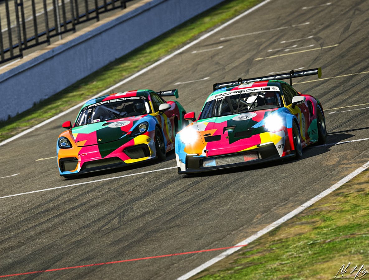Side by side view of Cayman GT4 Clubsport MR and Porsche 911 GT3 Cup wrapped in the Porsche 75 years anniversary celebration colours on the racetrack.