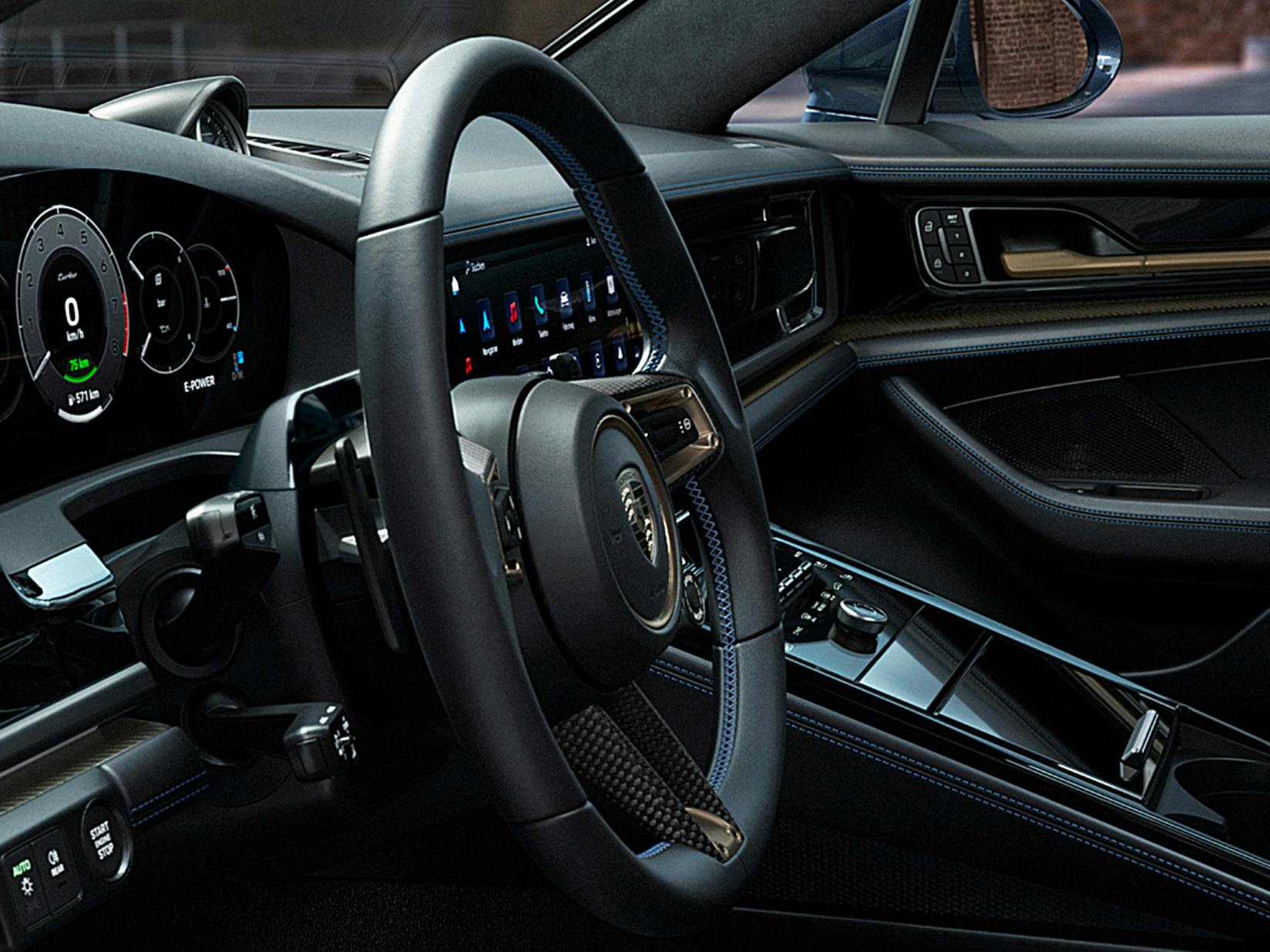 Detailed view of the multifunction GT sports steering wheel with matt carbon steering wheel trim in the Porsche Exclusive Manufaktur Panamera Turbo S E-Hybrid.