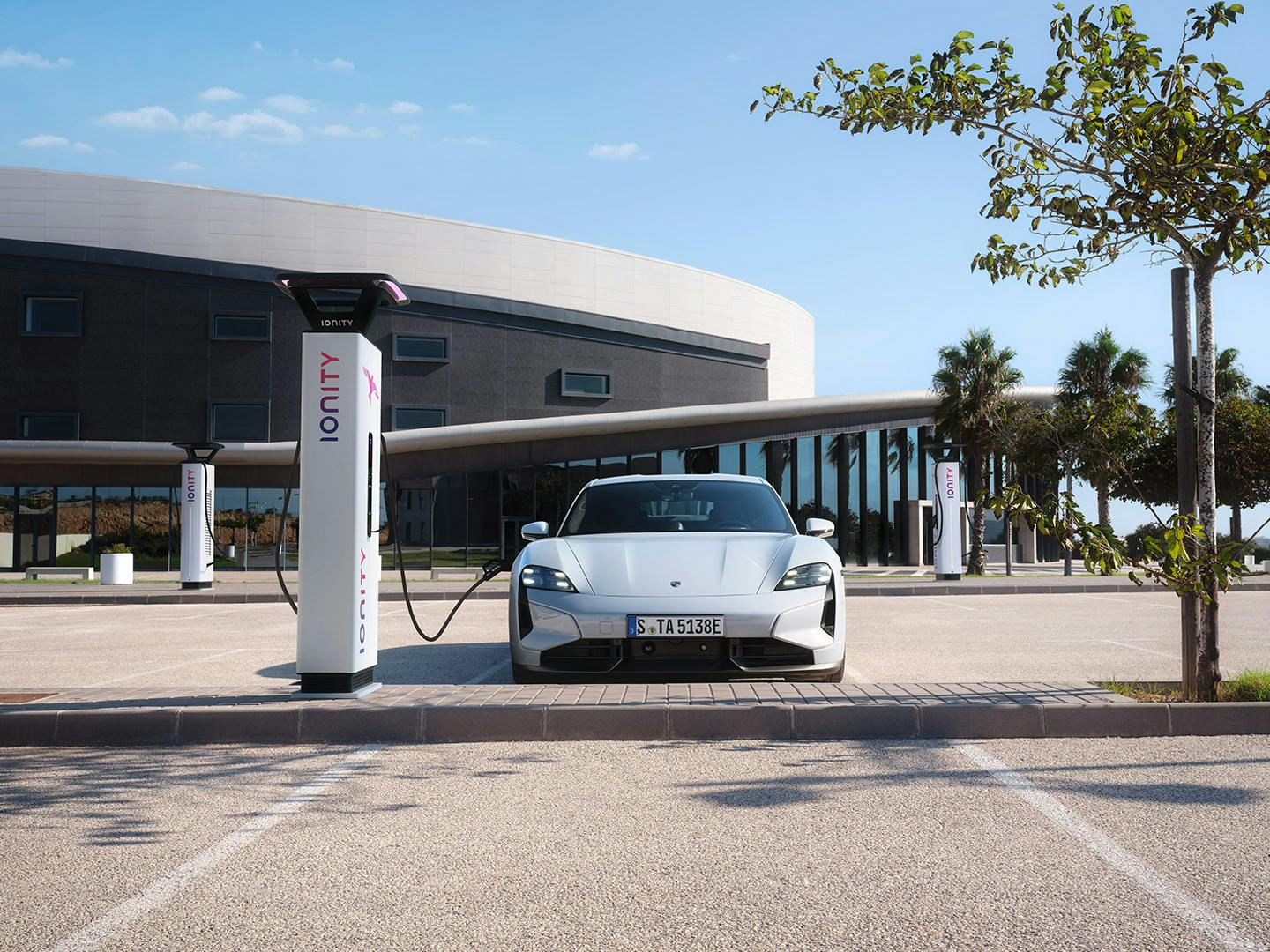 Taycan parked while being charged by an Ionity charge station.