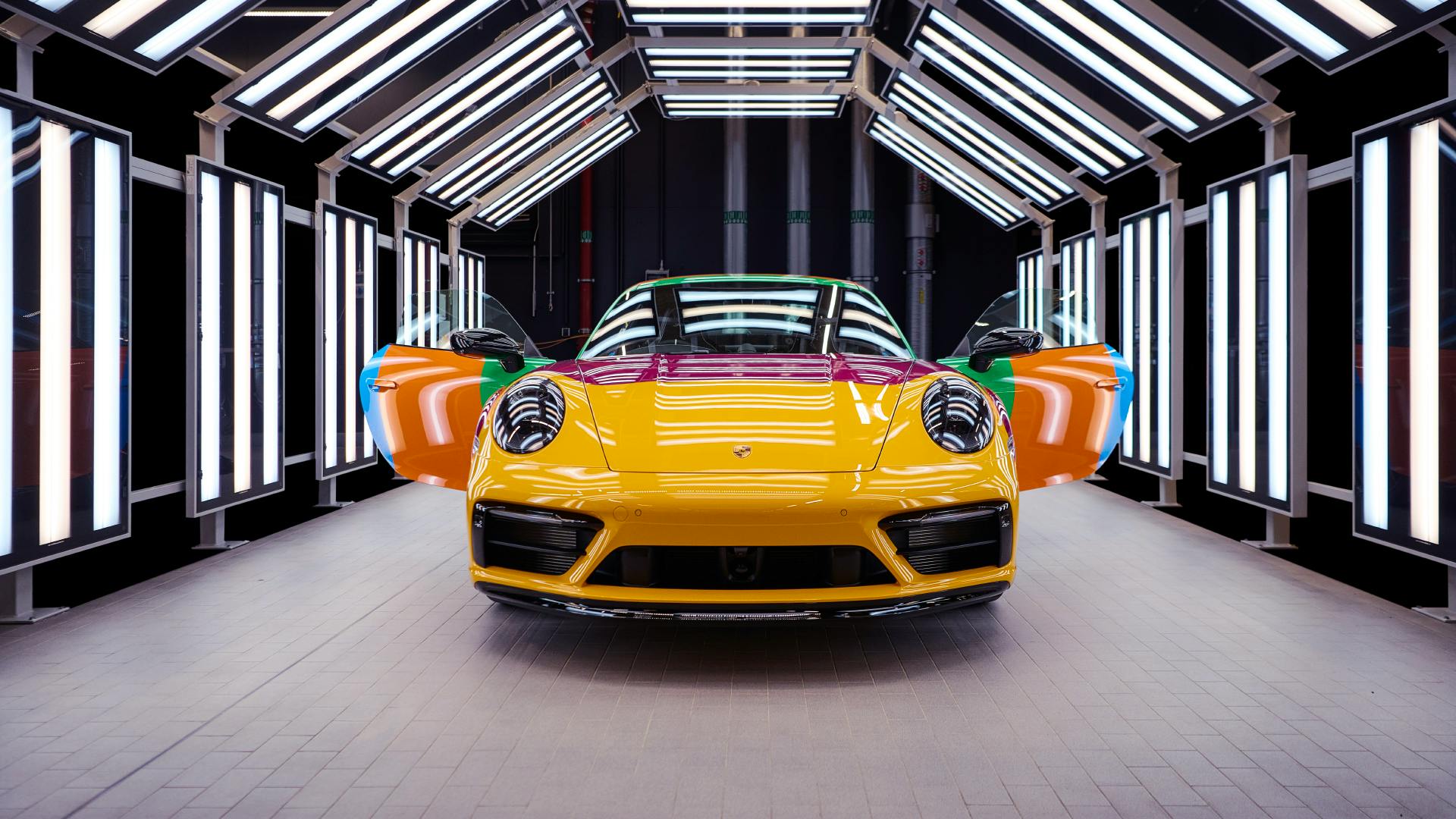 Dreams in Colours: Front of 911 model painted in bars with all seven colours of the 30 Years Porsche Thailand Edition.