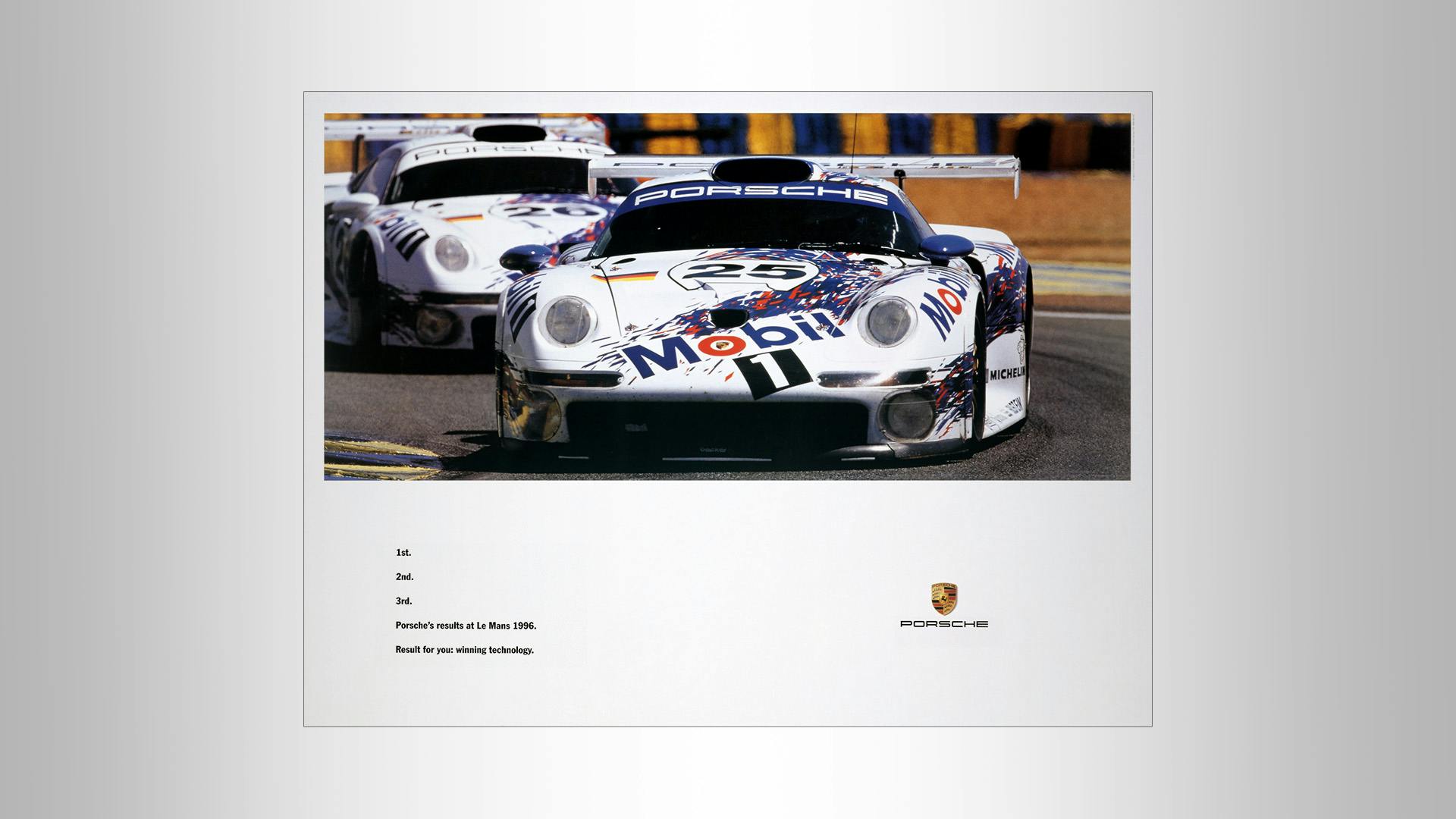 Porsche victory poster with a picture on the racetrack of Le Mans 1996 on a white background.