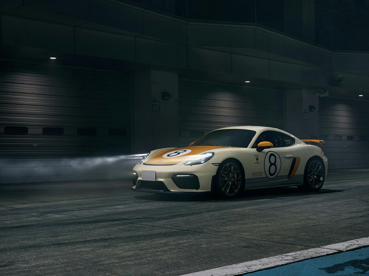 A 718 Cayman Gt4 RS Tribute to 906 Start number 8 coloured in Lightivory with rear wing, rear mirrors and side air intakes in Sinalyellow.