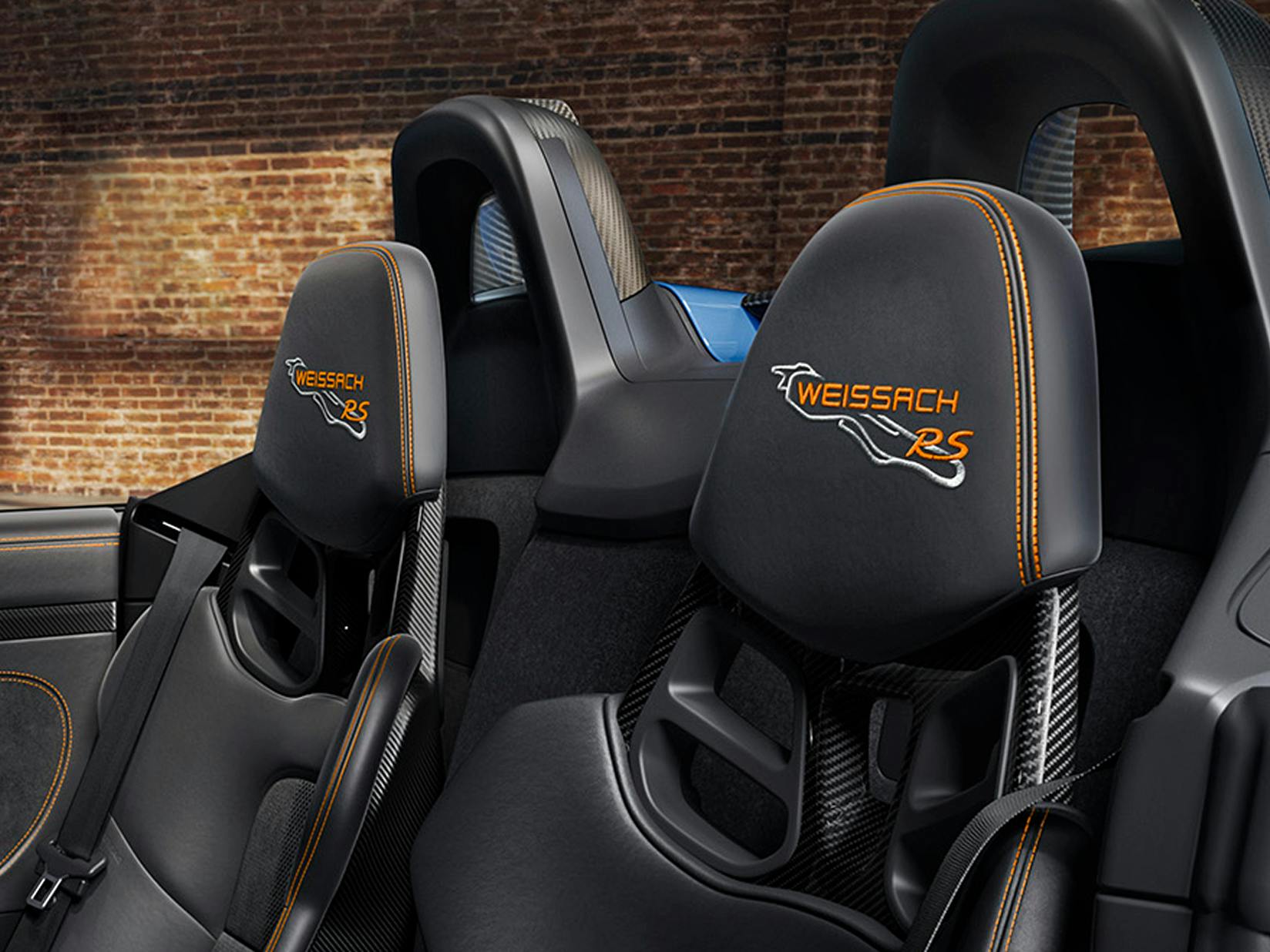 Detailed view of the embroidered seat headrests in the Porsche Exclusive Manufaktur 718 Spyder RS.
