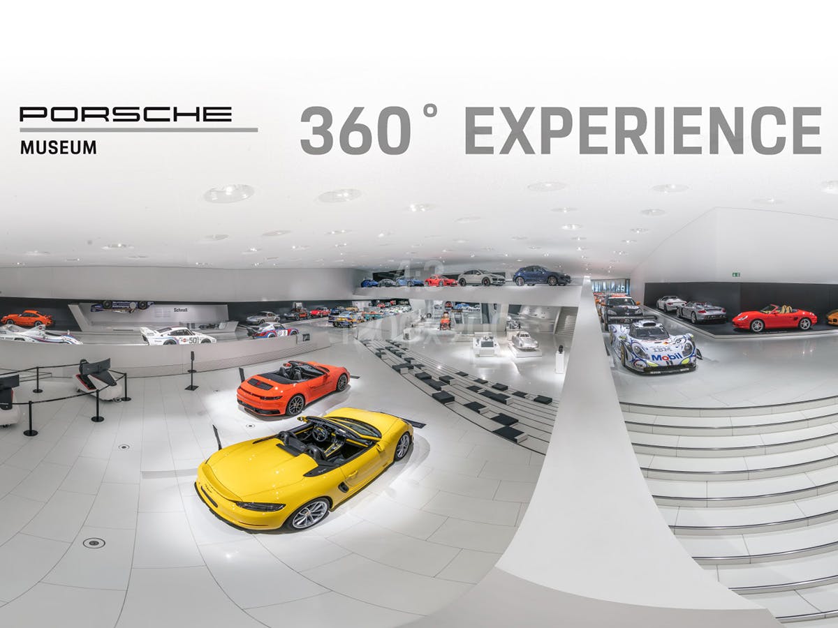 Excerpt from the Porsche museum exhibition. The lettering "360° Experience" is emblazoned above the vehicles.