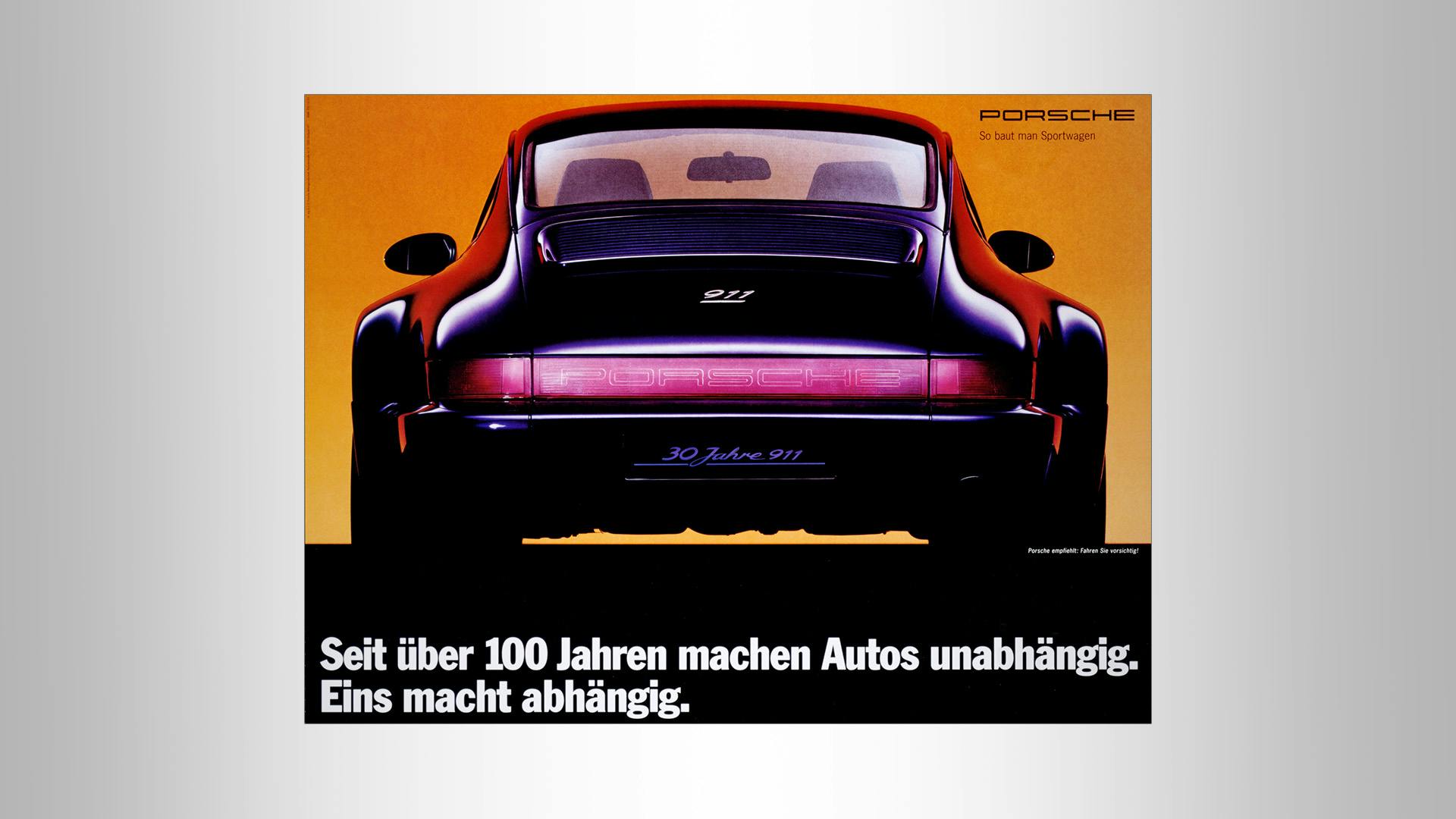 Porsche advertising poster from 1993: 911 with Porsche light band rear fascia and the slogan: Seit über 100 Jahren machen Autos unabhängig. Eins macht abhängig.