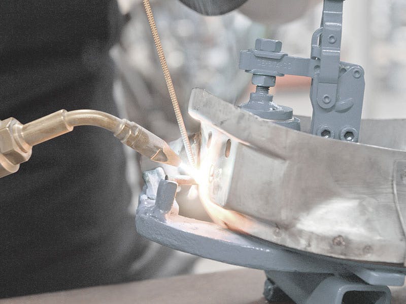 Detail shot: grinding process, wing, sparks