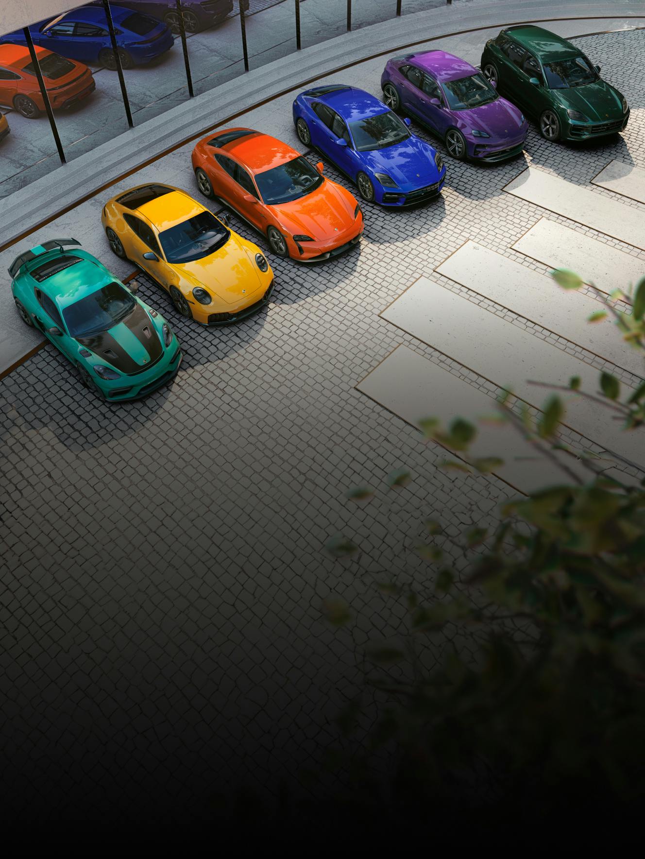 Meerdere Porsche modellen staan naast elkaar.