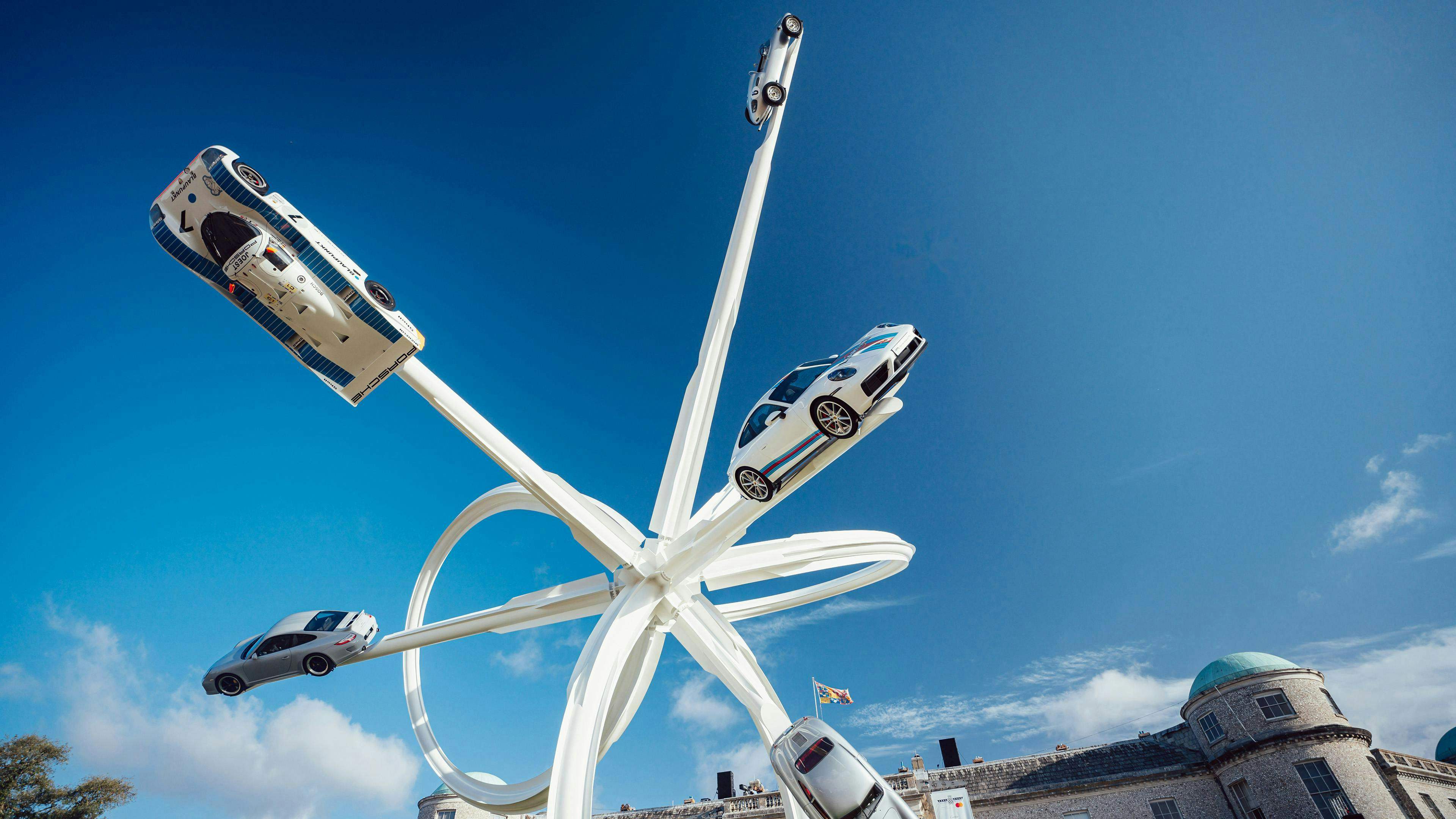 A closer up view of the Porsche central feature at Goodwood Festival of Speed 2023, where the five cars are a lot more visible.