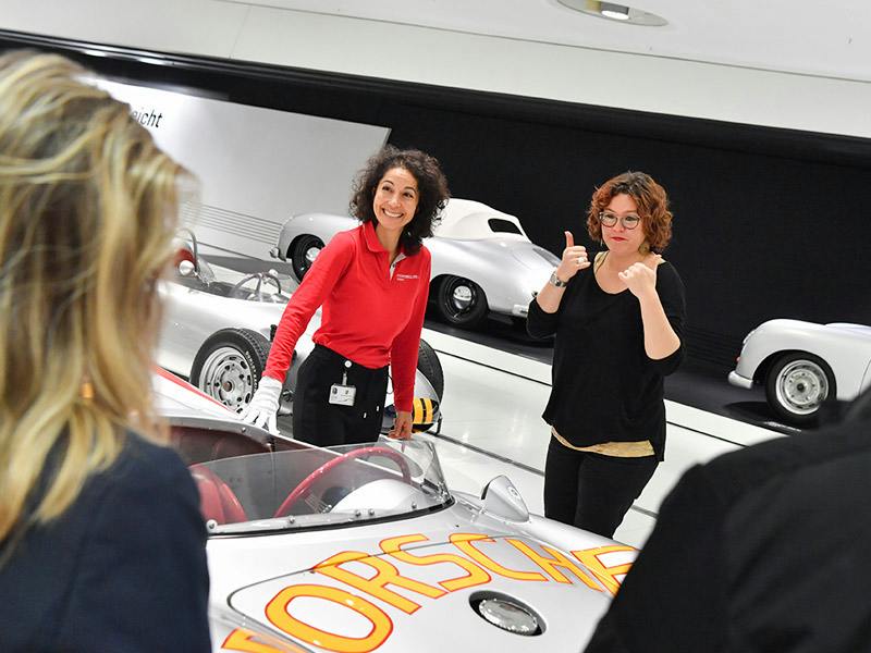 A guided tour of the Porsche Museum in sign language for hearing-impaired visitors