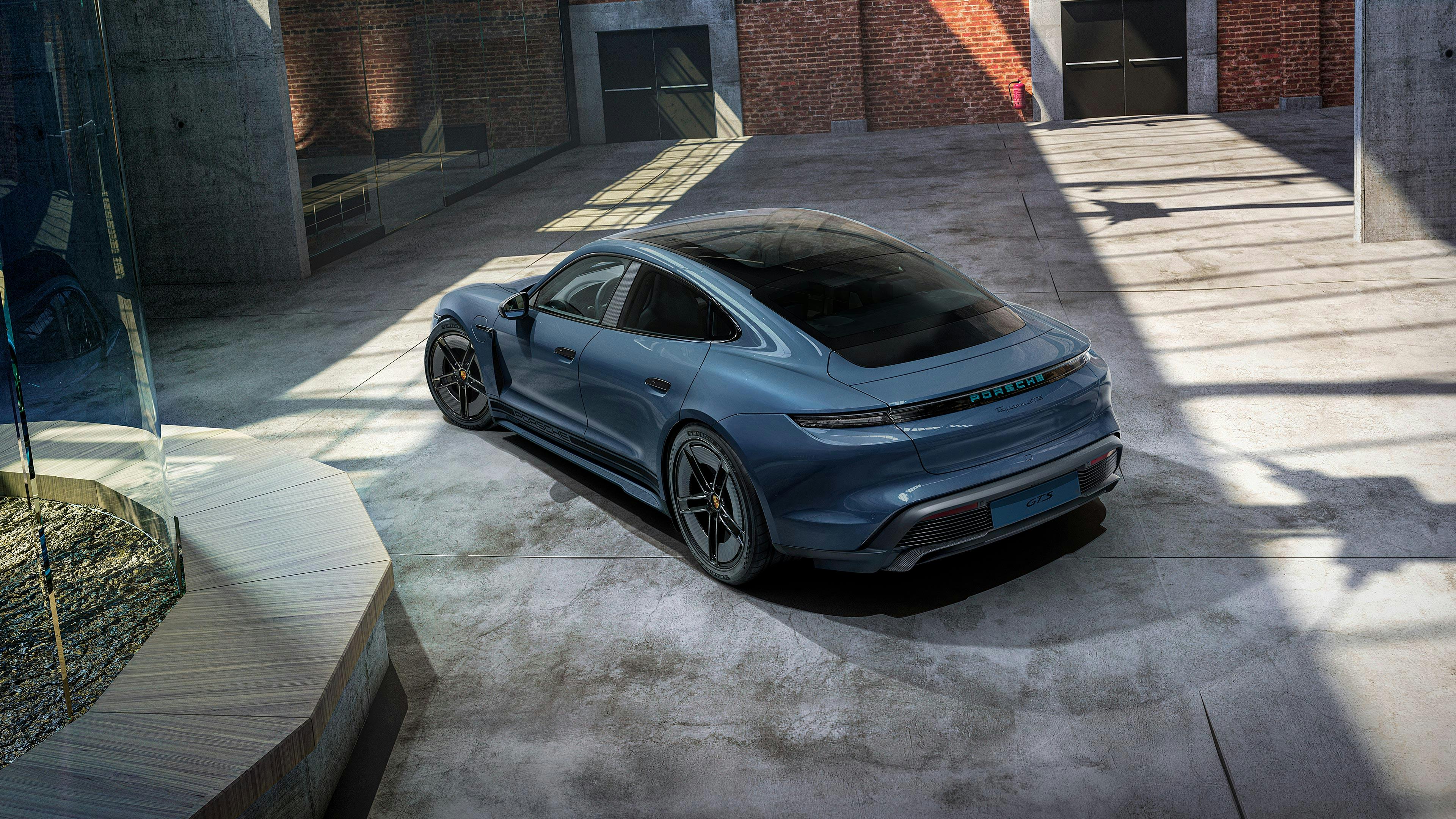 Porsche Exclusive Manufaktur Taycan GTS with SportDesign Package Carbon in Pale Blue Metallic.