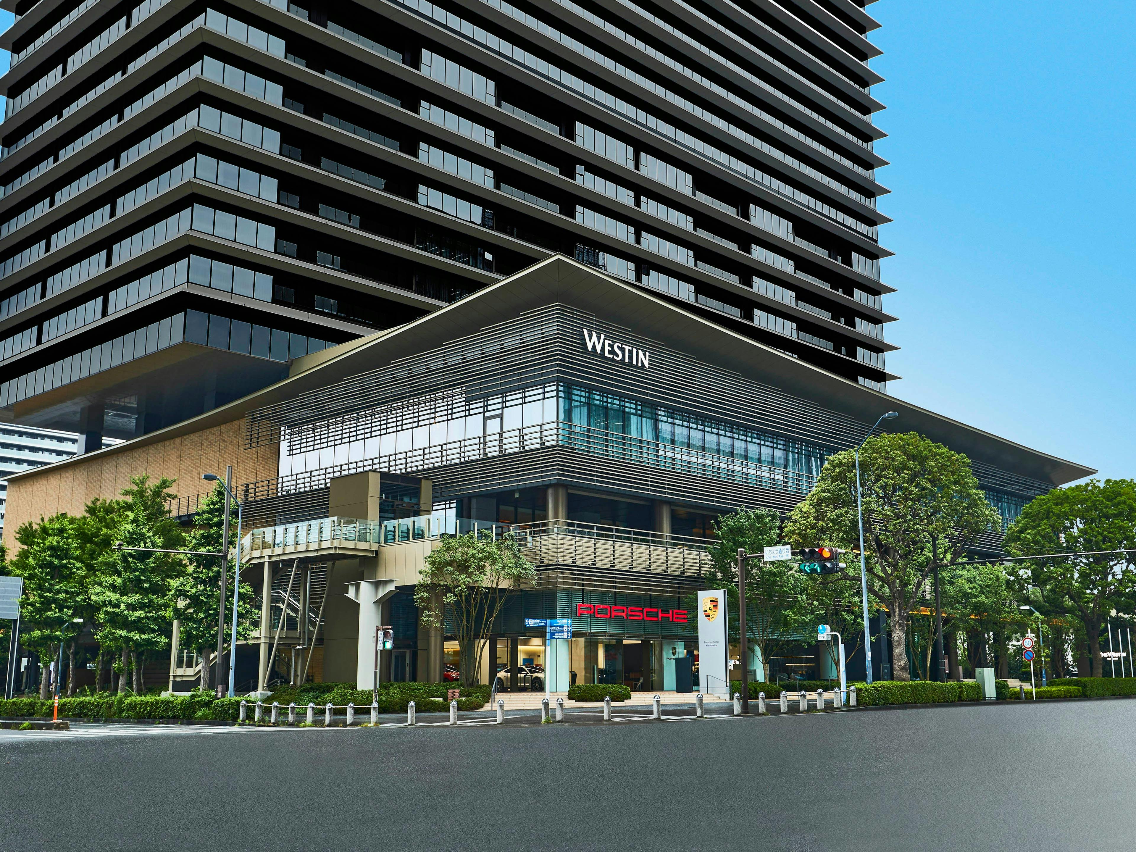 The exterior of the Porsche Center Minatomirai buidling, a Porsche Drive rental station located in Yokohama.