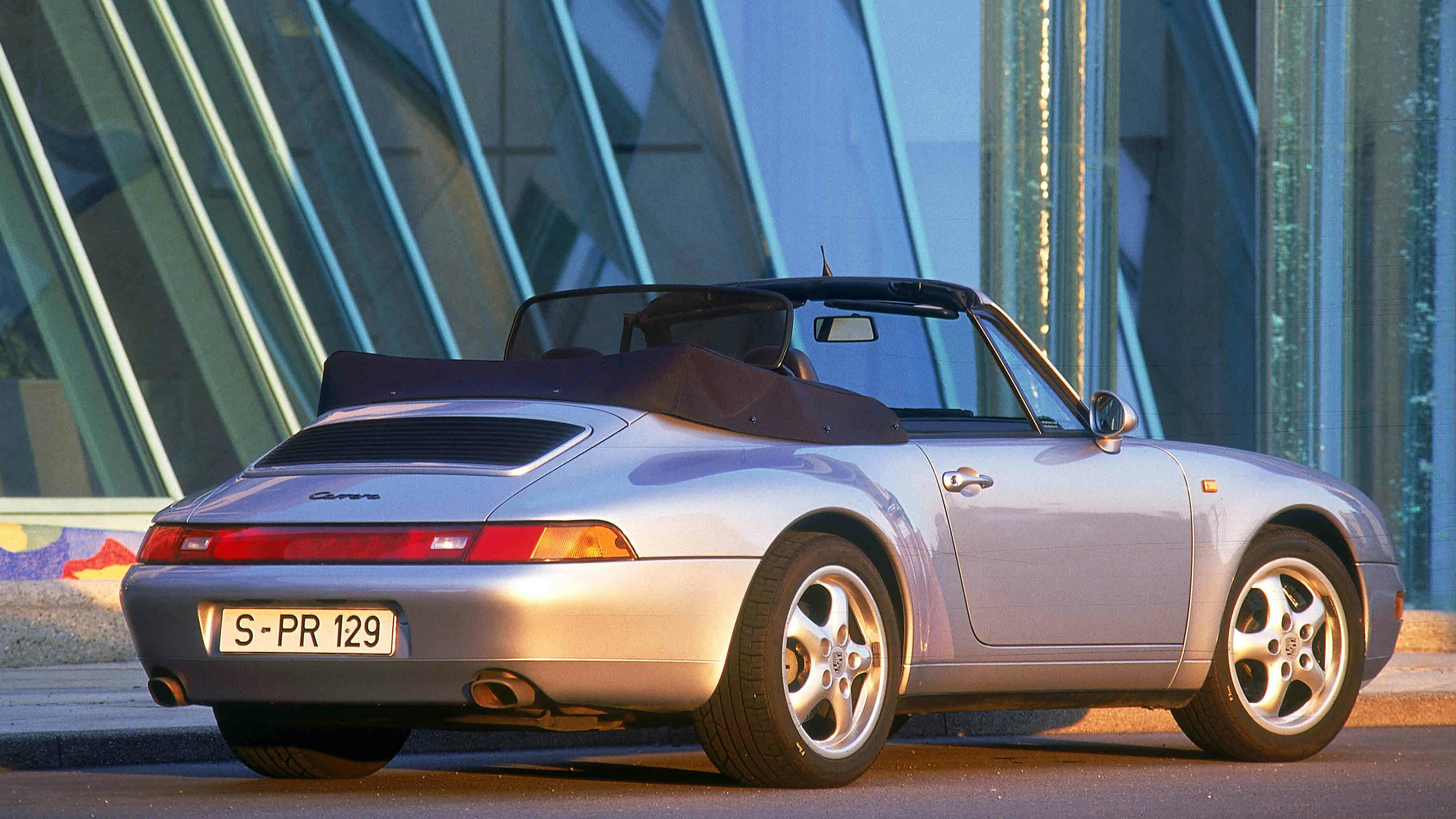 Silver Porsche 911 Carrera Cabriolet