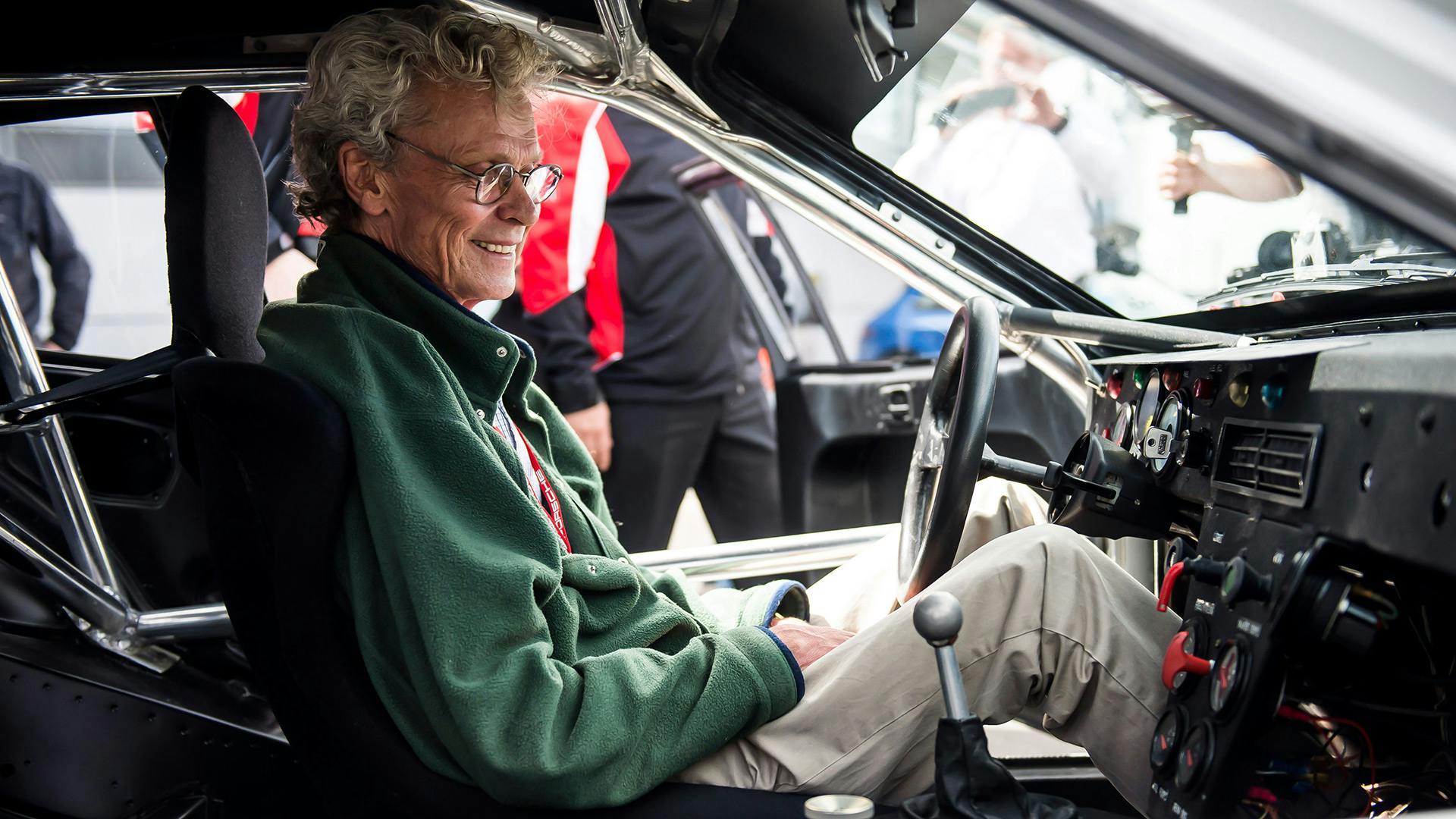 Tony Dron sitting inside the fully restored Porsche 924 GTP.