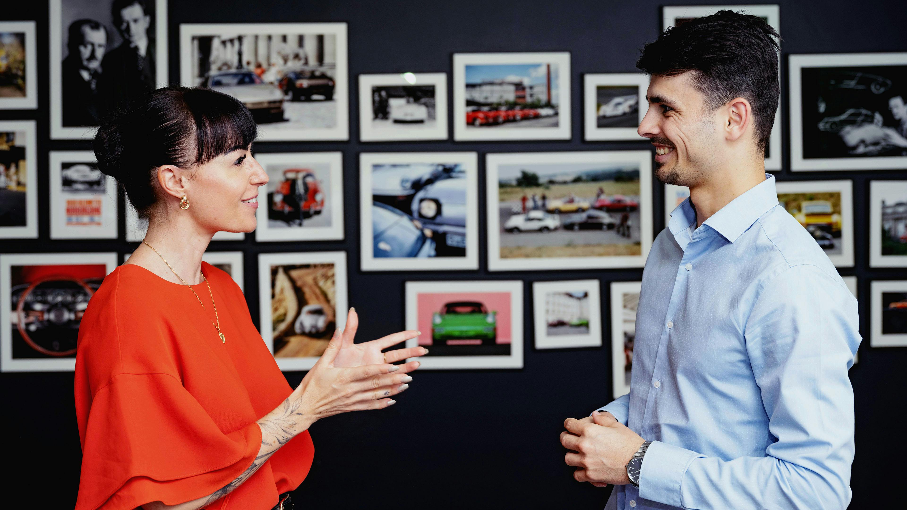 1 woman and 1 man talking.