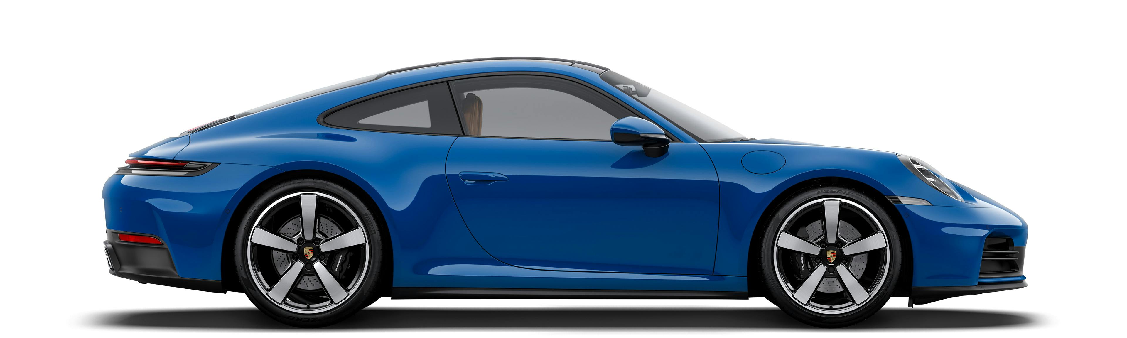 Side shot of a lugano blue Porsche 911 Carrera on a white background.
