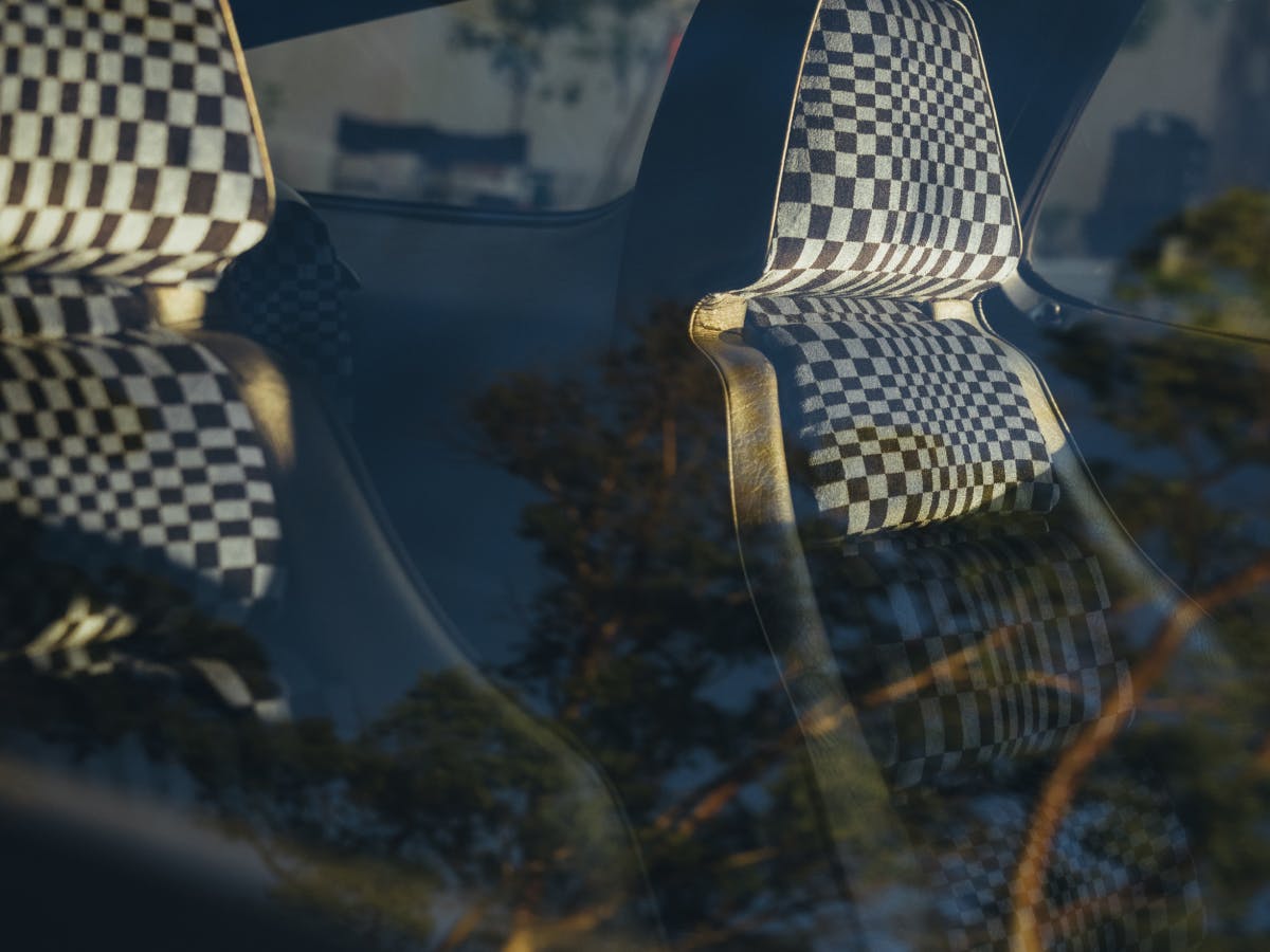 Detailed view of Porsche seats with Pasha pattern.